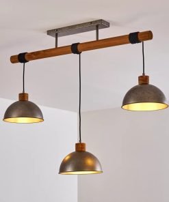 Suspension THOLEN – Bois & Métal brut ✨
Un luminaire au style industriel vintage qui allie authenticité et élégance.