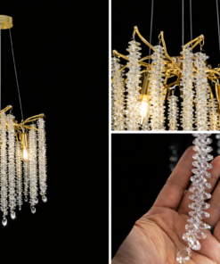 Alternative view of Magnifique lustre avec structure dorée et cascades de cristaux.